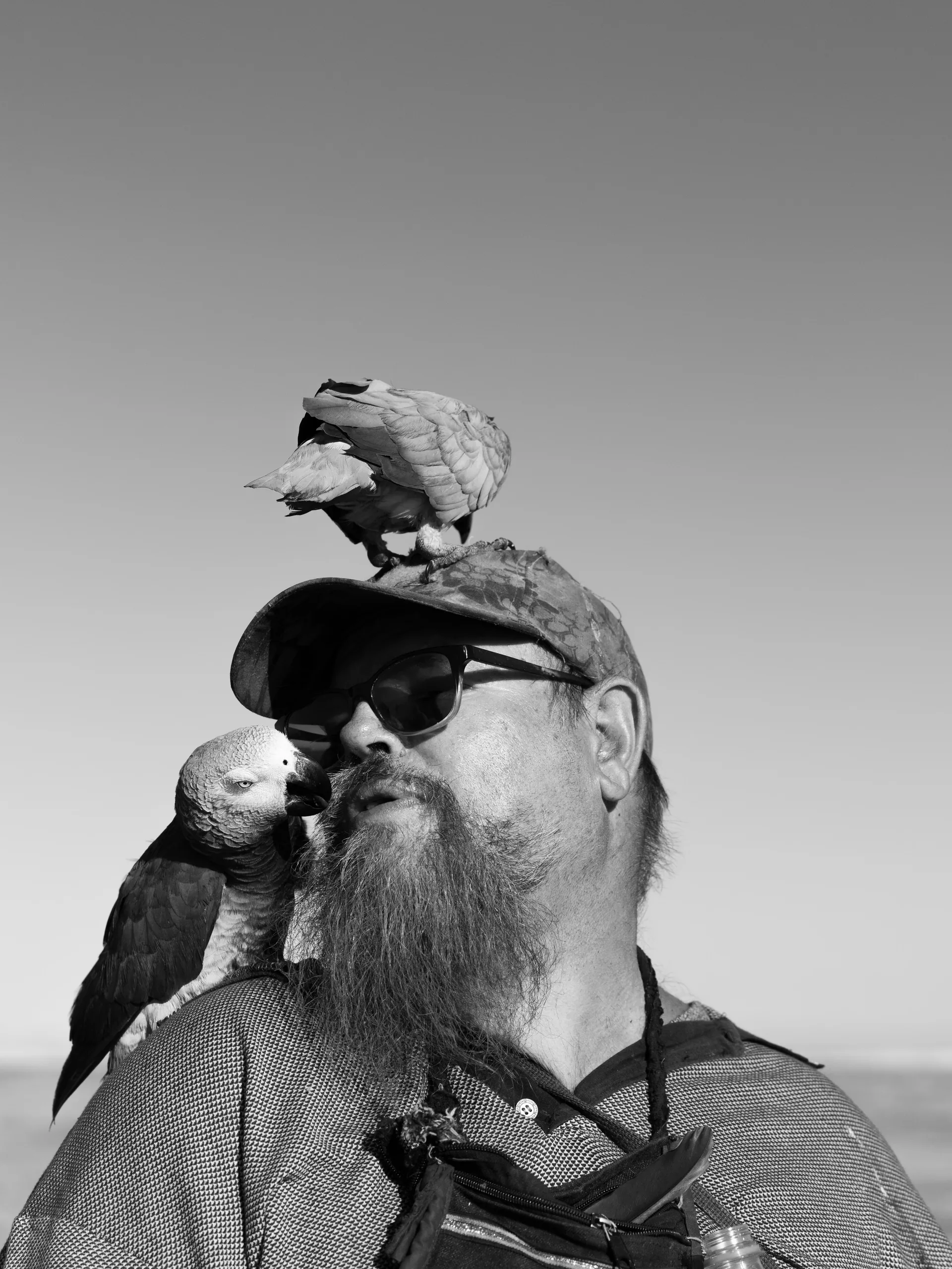 Durban man with parrots